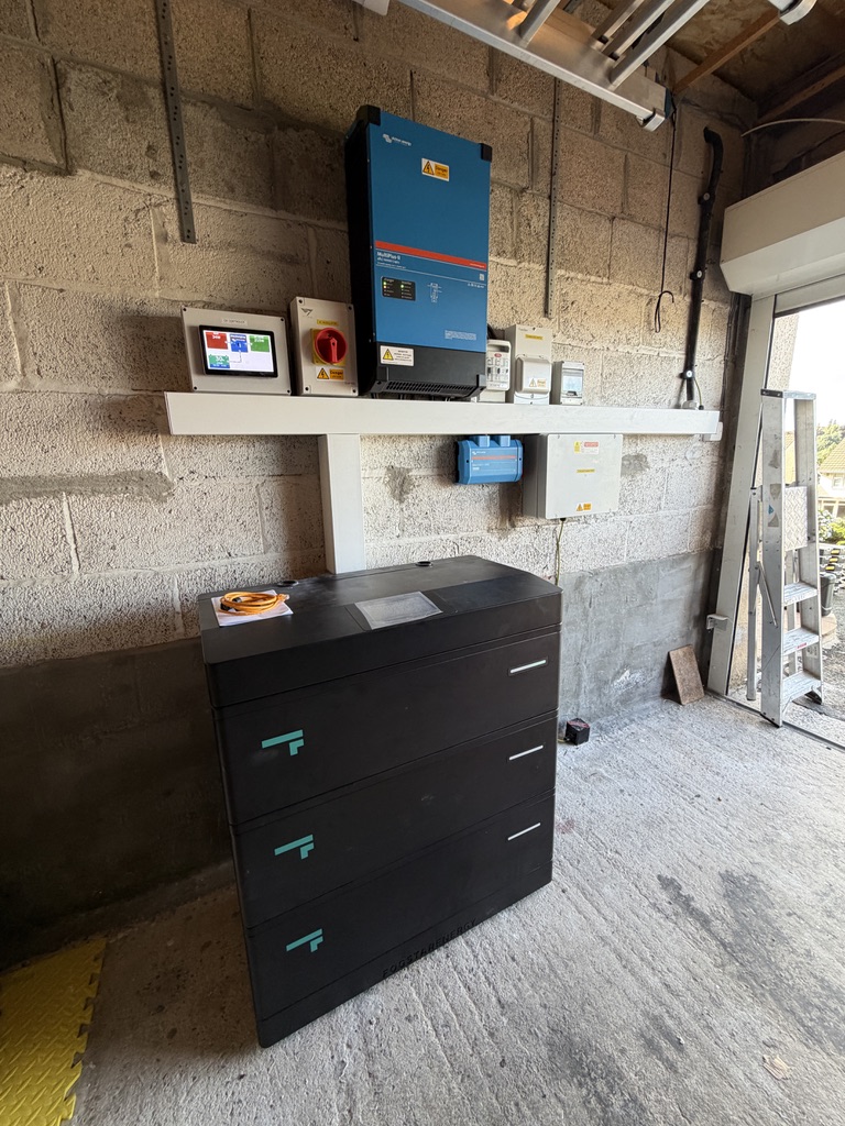 Victron MultiPlus-II inverter and control equipment above a three-module Fogstar battery stack